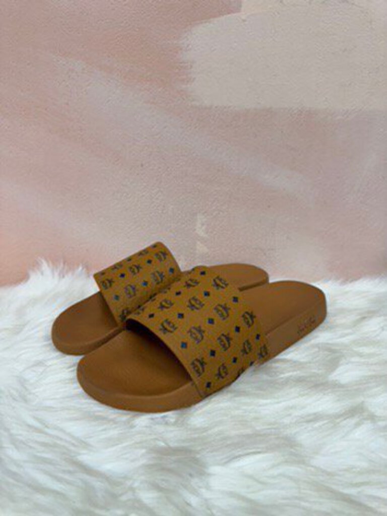 MCM Brown Logo Slides